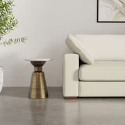 Leyla side table by Simpli-Home with antique brass finish, featuring a sleek round top and modern minimalist design.