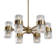 Uttermost Marinot 12-light gold chandelier with elegant, modern design featuring metal frames and crystal accents.