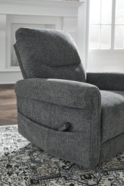 Signature Design by Ashley Aureta Power Lift Recliner in neutral fabric with padded armrests and plush cushioning.