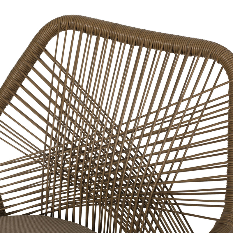 Modern wicker dining club arm chair by Noble House with water-resistant cushions in brown and beige, suitable for outdoor or indoor use.