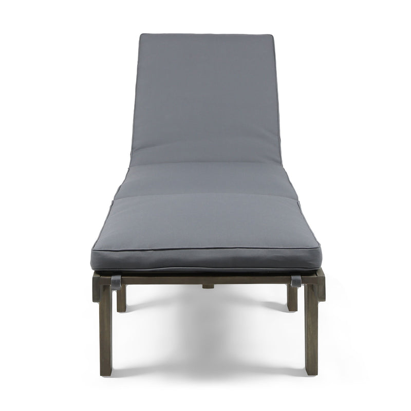 Noble House Ariana wood chaise lounge with cushion, featuring a sleek design and comfortable seating for outdoor or indoor use.