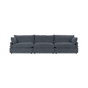 Classic Home Caplan modular sectional sofa with beige fabric upholstery, featuring multiple seating sections and plush cushions.