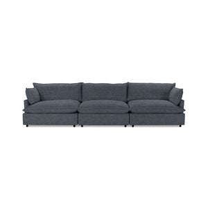 Classic Home Caplan modular sectional sofa with beige fabric upholstery, featuring multiple seating sections and plush cushions.