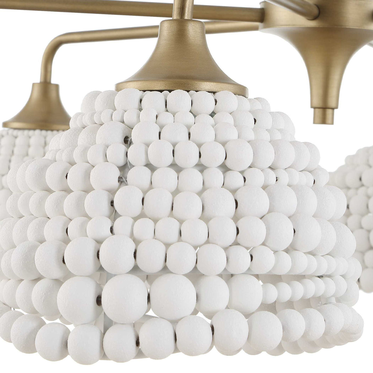 White 6-light beaded pendant light by Uttermost, featuring intricate beaded design for stylish pendant lighting.