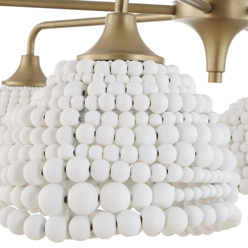 White 6-light beaded pendant light by Uttermost, featuring intricate beaded design for stylish pendant lighting.