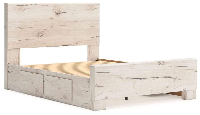 Signature Design by Ashley Lawroy panel bed with built-in storage drawers in a modern bedroom setting.