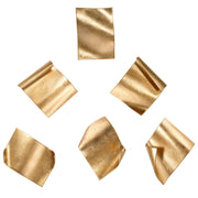 Set of six gold Fluttering Pages wall decor pieces by Uttermost, featuring abstract, leaf-like designs for modern interior decoration.