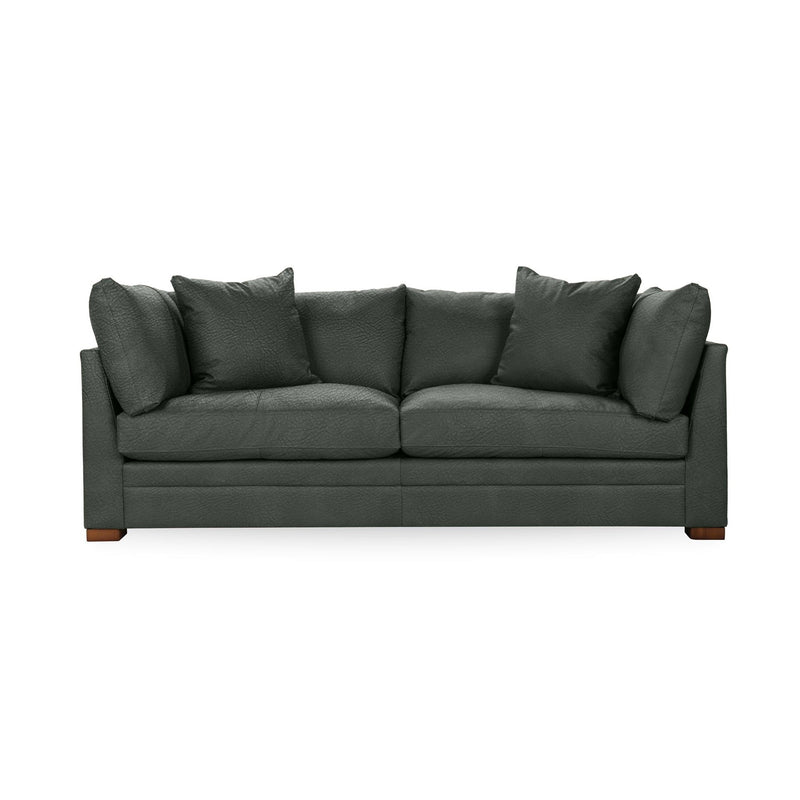Classic Home Audrey stationary sofa with plush cushions and elegant design, showcasing a comfortable seating area.