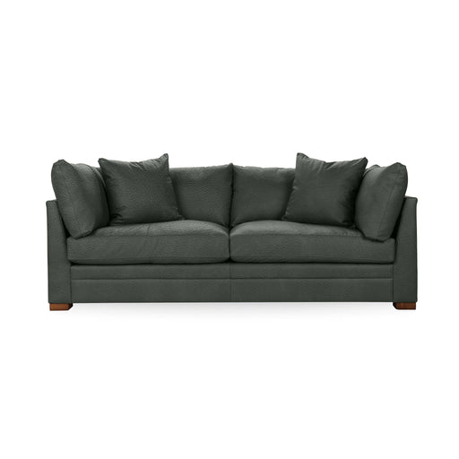 Classic Home Audrey stationary sofa with plush cushions and elegant design, showcasing a comfortable seating area.