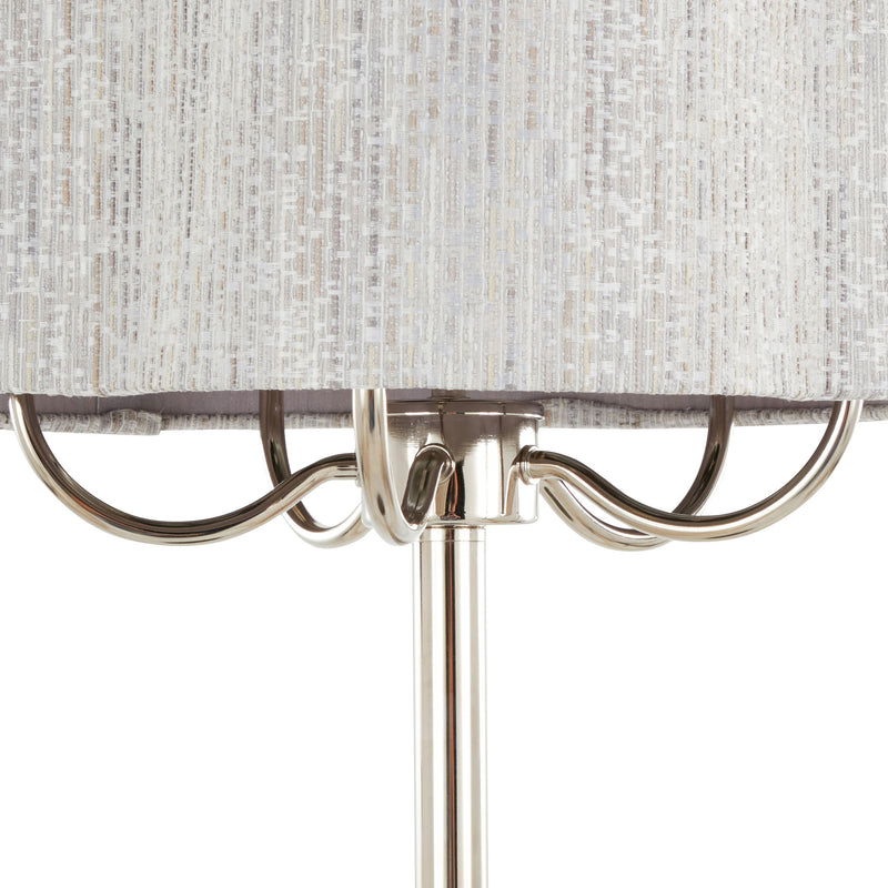 Lumi Source Lily contemporary table lamp with polished nickel finish and gray fabric shade on a sleek surface.