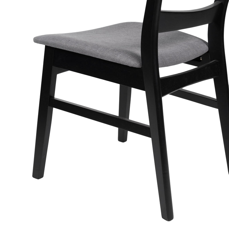 Modern Noble House dining side chair with upholstered seat and wooden frame, showcasing stylish and comfortable seating.