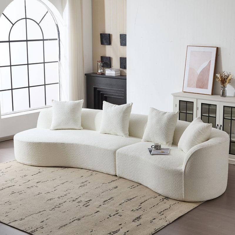 Noble House elegant curved sectional sofa with full foam cushioning, showcasing plush seating and stylish design.