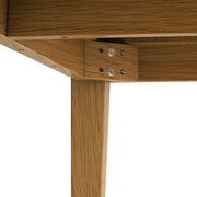 Contemporary Simpli-Home Colby dining table with sleek wooden surface and modern design, ideal for modern dining rooms.