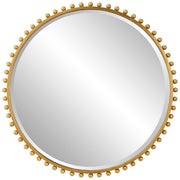 Round iron wall mirror by Uttermost with a sleek, minimalist frame, perfect for modern interior decor.