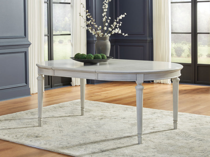 Montelaine - Oval Dining Room Extension Table - Antique White - R&R Furniture Gallery (Fountain Valley, CA)