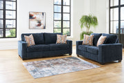 Signature Design by Ashley Aviemore living room set with stationary sofas and loveseats, featuring plush upholstery and modern design.