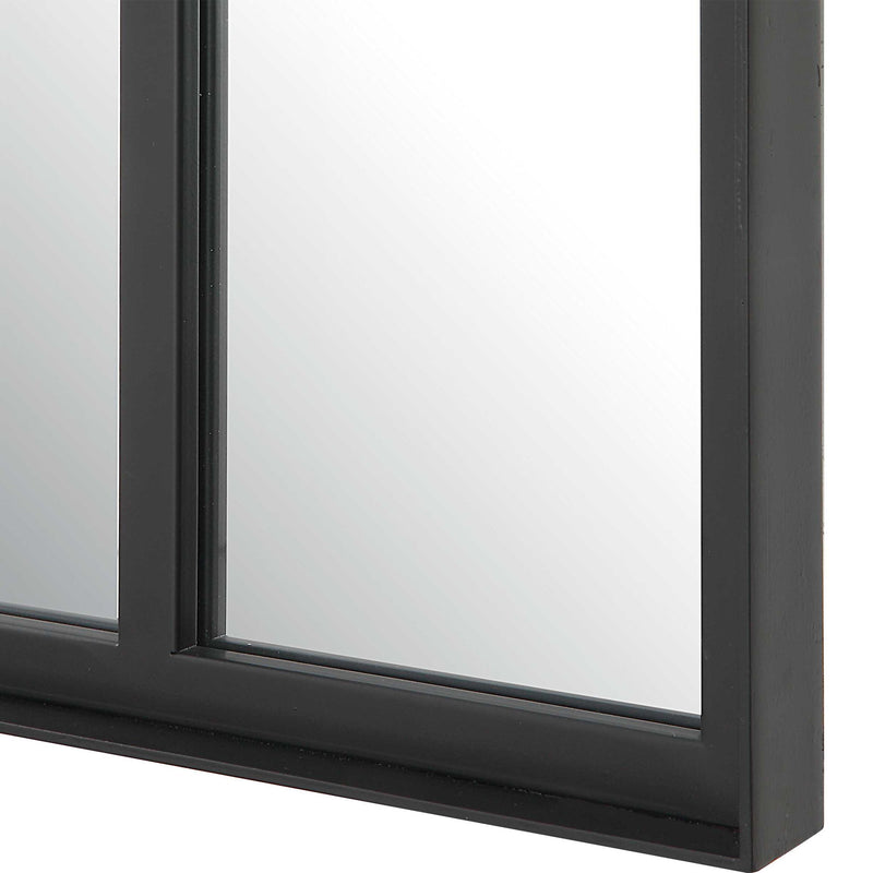 Black oversized arch mirror by Uttermost, accent mirror with a modern, curved design and sleek black frame.