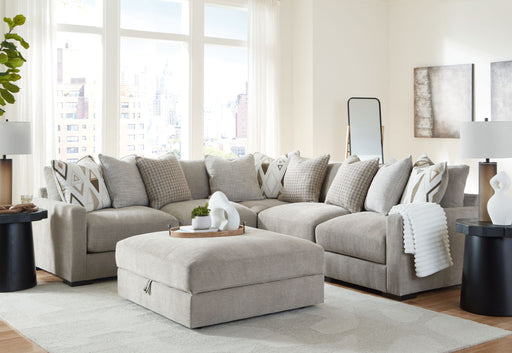 Benchcraft® Aslan Court 5-piece sectional living room set with matching ottoman, featuring plush upholstery and modern design.