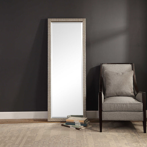 Silver metallic floor mirror by Uttermost, Cacelia design with a sleek, reflective mirror surface and modern frame.