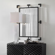 Uttermost Balkan Iron Wall Mirror featuring an ornate metal frame with intricate details and a vintage-inspired design.