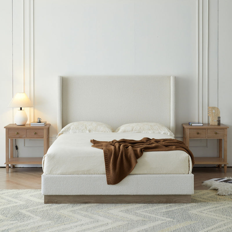 House & Home Furniture Hosford minimalist upholstered wingback bed with wood platform base, showcasing a sleek, modern design.
