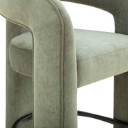 TOV Furniture Malone counter height stool with wooden legs and cushioned seat, ideal for kitchen or bar area.