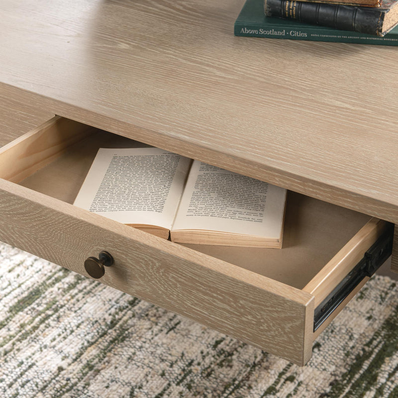 Classic Home Allysyn coastal drift writing desk with a sleek wooden surface and modern design, ideal for home office or study space.
