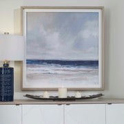 Distant Land framed print by Uttermost featuring a serene blue landscape artwork in a sleek frame.