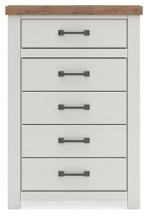 Benchcraft Savonport five-drawer accent chest in white and brown wood finish, showcasing its sleek design and ample storage drawers.