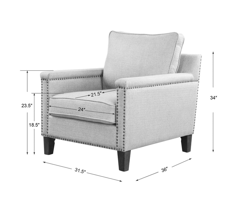 Uttermost Charlotta accent arm chair in Sea Mist fabric with plush cushions and wooden legs, stylish and comfortable seating.