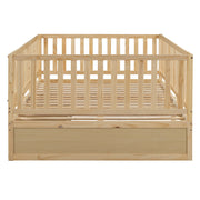 DreamHaus storage daybed with fence guardrails and two drawers, convertible into a floor bed and daybed.