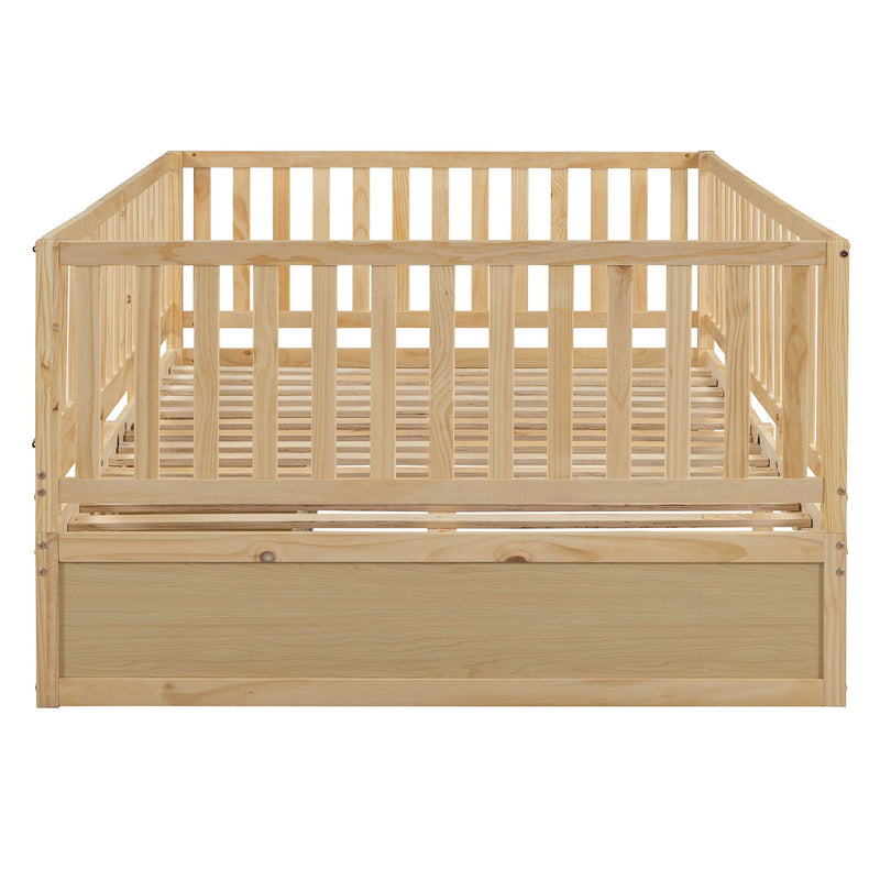 DreamHaus storage daybed with fence guardrails and two drawers, convertible into a floor bed and daybed.
