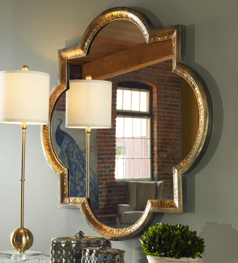 Uttermost Lourosa gold wall mirror with a sleek, modern frame, perfect for contemporary home decor.