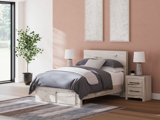 Signature Design by Ashley Lawroy panel bed with built-in storage drawers and a modern wood finish, shown in a stylish bedroom setting.