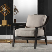 Uttermost Lyle beige accent arm chair with plush upholstery and wooden legs, stylish and comfortable for living room decor.