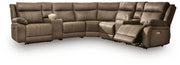 Signature Design by Ashley Max-Momentum reclining sectional with plush cushions and reclining seats in a modern living room setting.