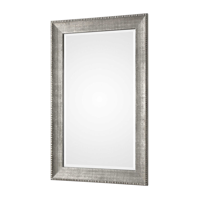 Silver metallic wall mirror by Uttermost, Leiston model, with a sleek and modern design perfect for contemporary decor.