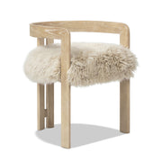 Jennifer Taylor Home Millwick low back dining chair with natural blonde wood finish, armrests, and modern design.