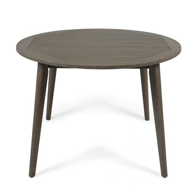 Noble House Stamford outdoor dining table with modern design, featuring a sleek rectangular top and sturdy legs for outdoor gatherings.
