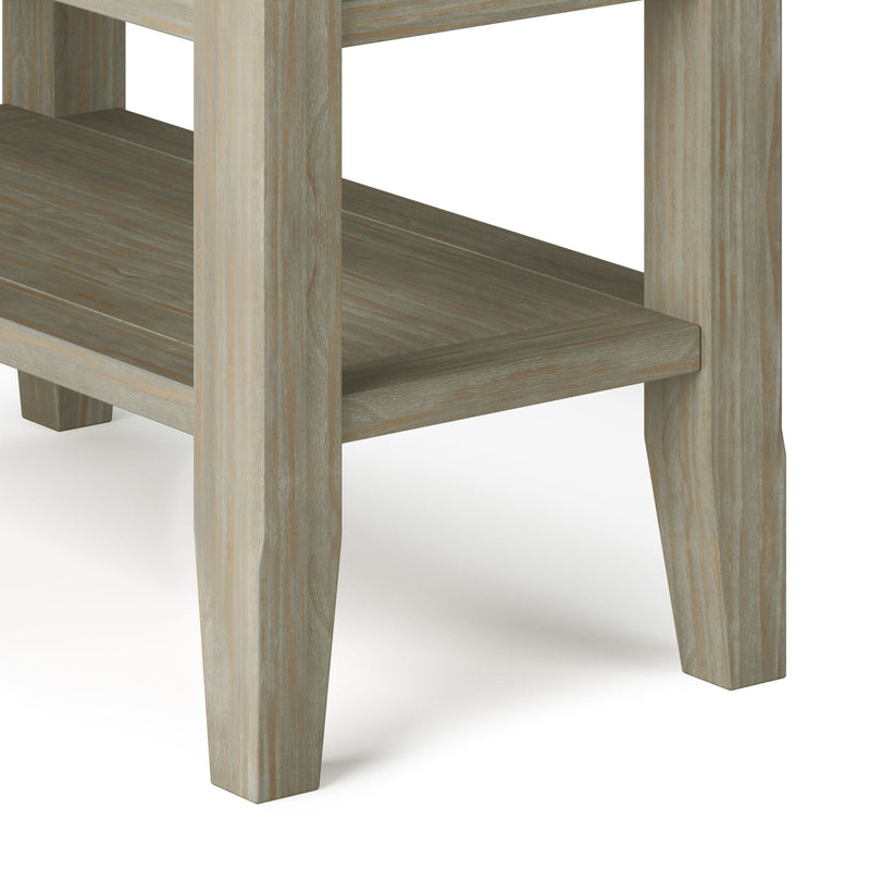 Handcrafted Acadian narrow side table by Simpli-Home with a natural wood finish and sleek, minimalist design.