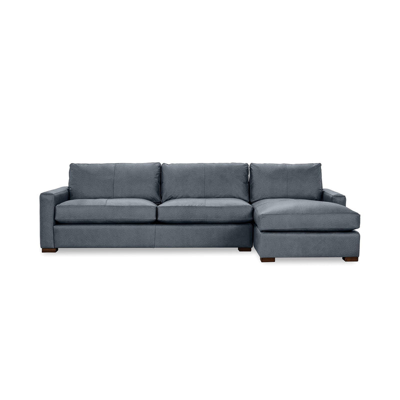 Classic Home Coburn chaise sofa from stationary sectionals set, featuring plush cushions and a modern design in a living room setting.