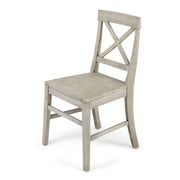 Set of two Noble House Plethora dining chairs with X-shaped back design, showcasing modern wooden frame and upholstered seats.