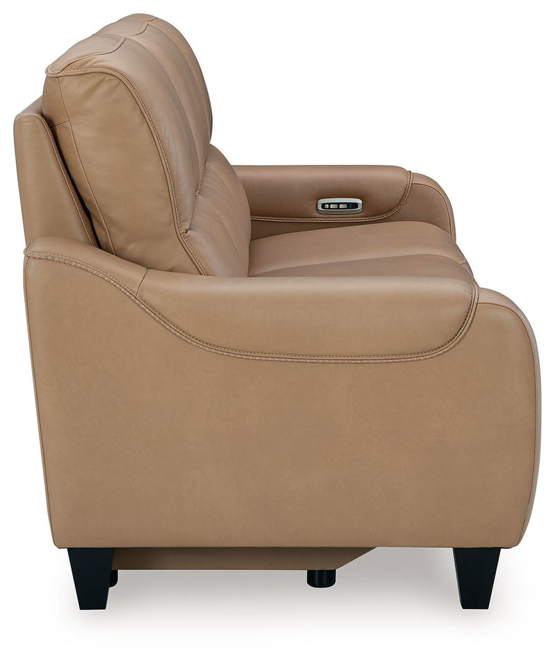Ashley Mosswell power reclining sofa with adjustable headrest in toffee leather, featuring plush cushions and modern design.