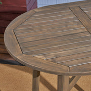 Noble House outdoor acacia wood bar table with slat top, perfect for patio or garden seating and outdoor entertaining.