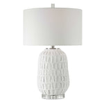 Uttermost Caelina textured white table lamp with a modern design, perfect for stylish home lighting.