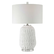 Uttermost Caelina textured white table lamp with a modern design, perfect for stylish home lighting.