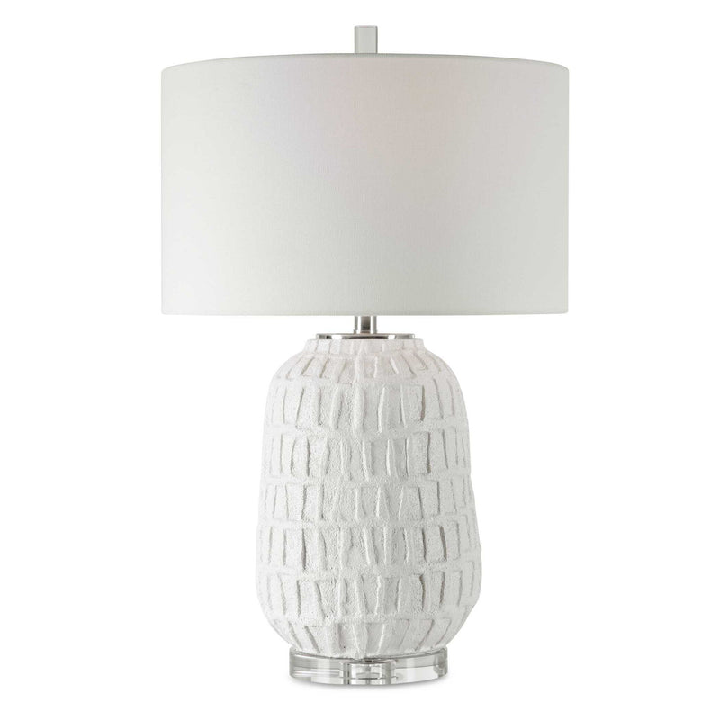 Uttermost Caelina textured white table lamp with a modern design, perfect for stylish home lighting.