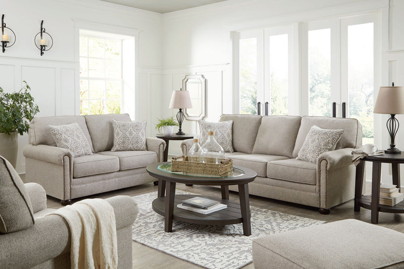 Signature Design by Ashley Gaelon living room set with stationary chair and ottoman in a modern, comfortable fabric design.