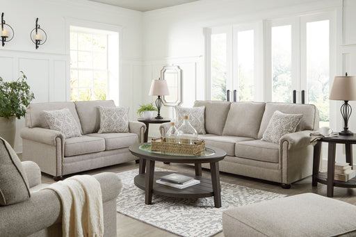 Signature Design by Ashley Gaelon living room set with stationary chair and ottoman in a modern, comfortable fabric design.