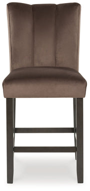 Set of two Jeshina upholstered barstools by Signature Design by Ashley in mocha with cushioned seats and wooden legs.